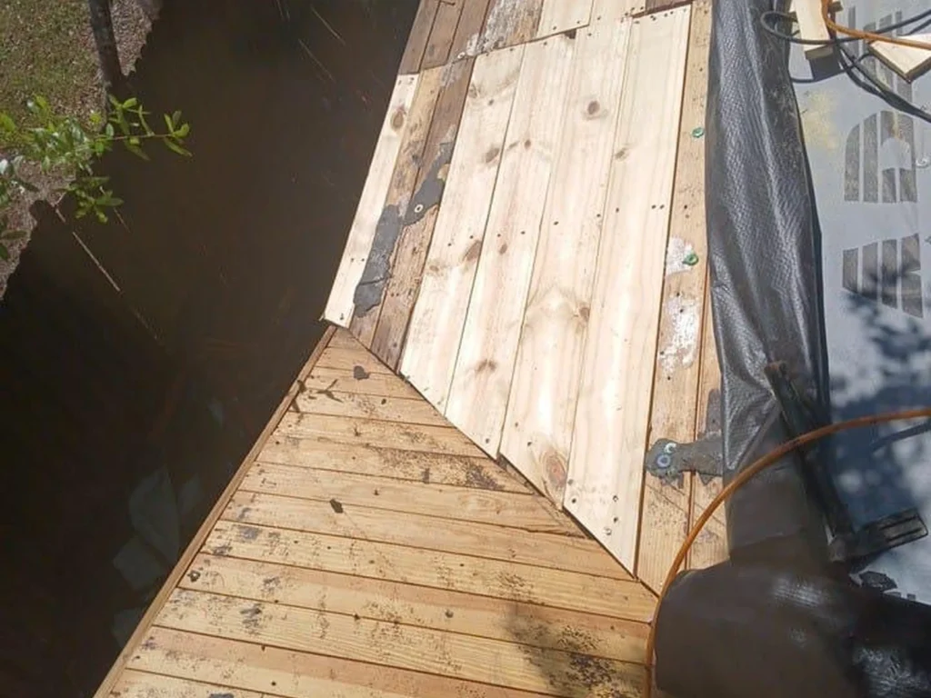 Close view of new roof-deck boards installed on the DeLand home