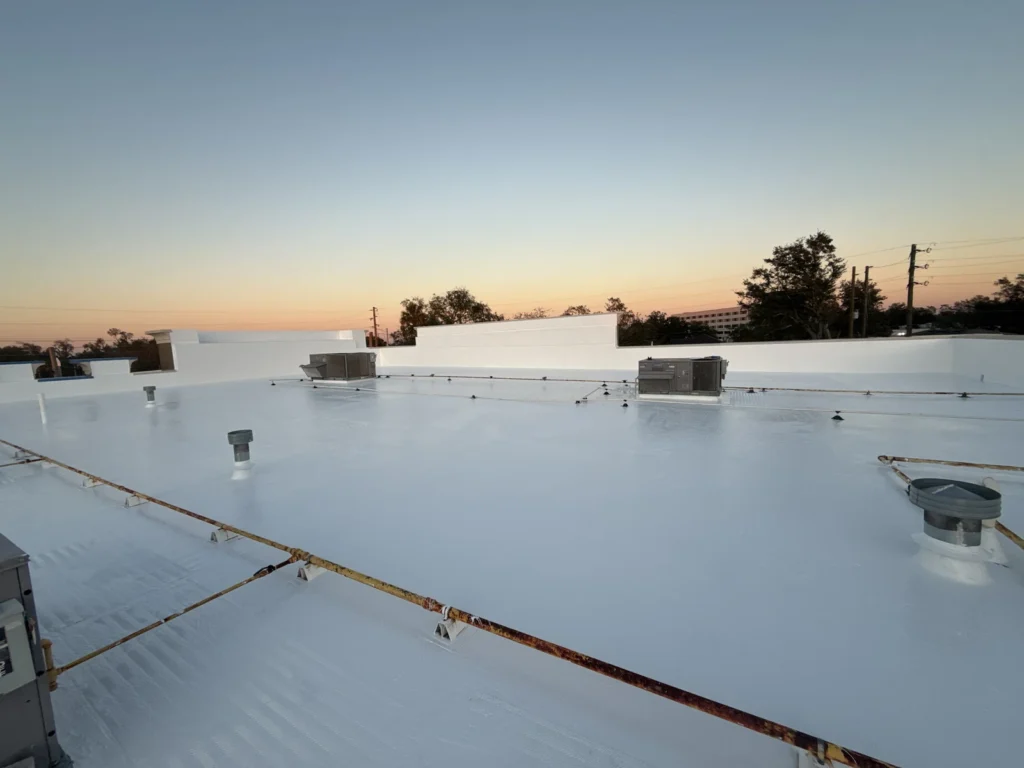 Sunset view across the completed DeLand commercial roof coating