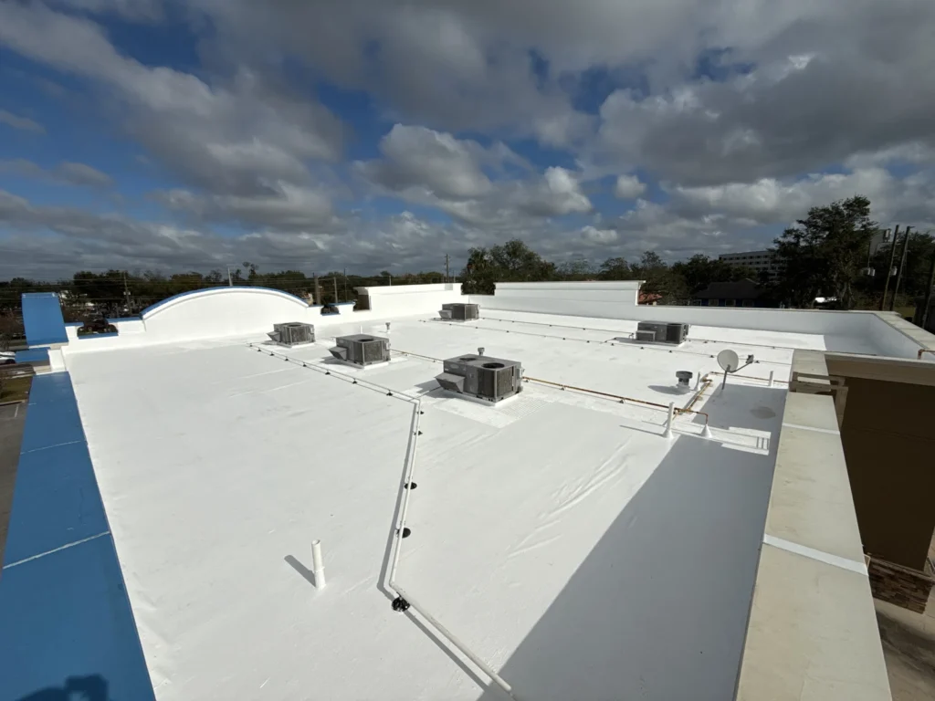 View across the completed silicone-coated commercial roof