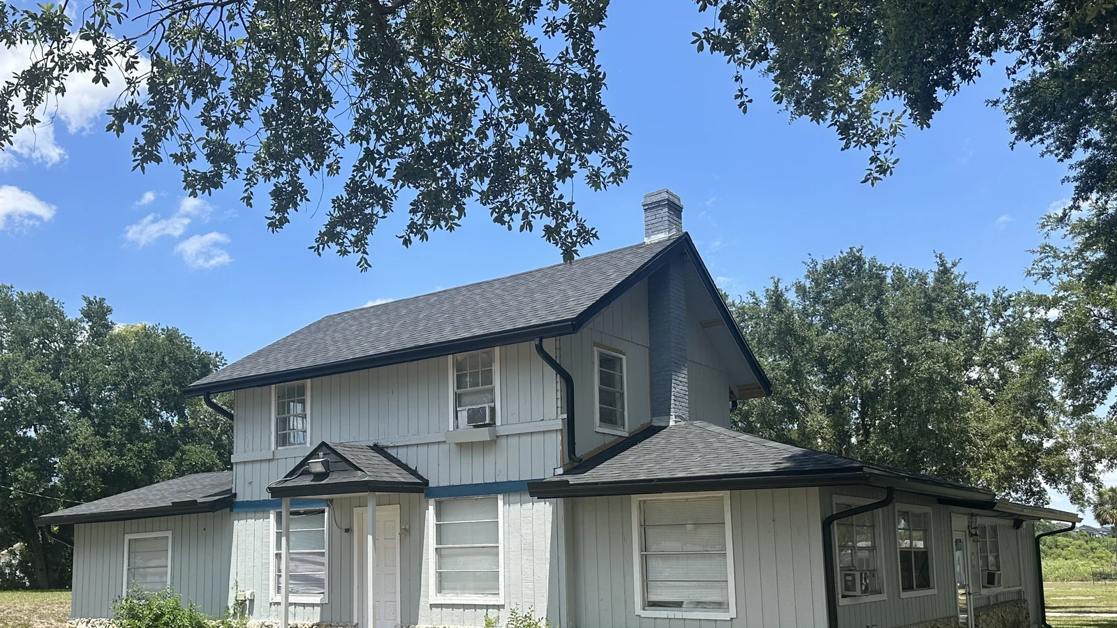 Forest City worship building with its completed architectural shingle roof