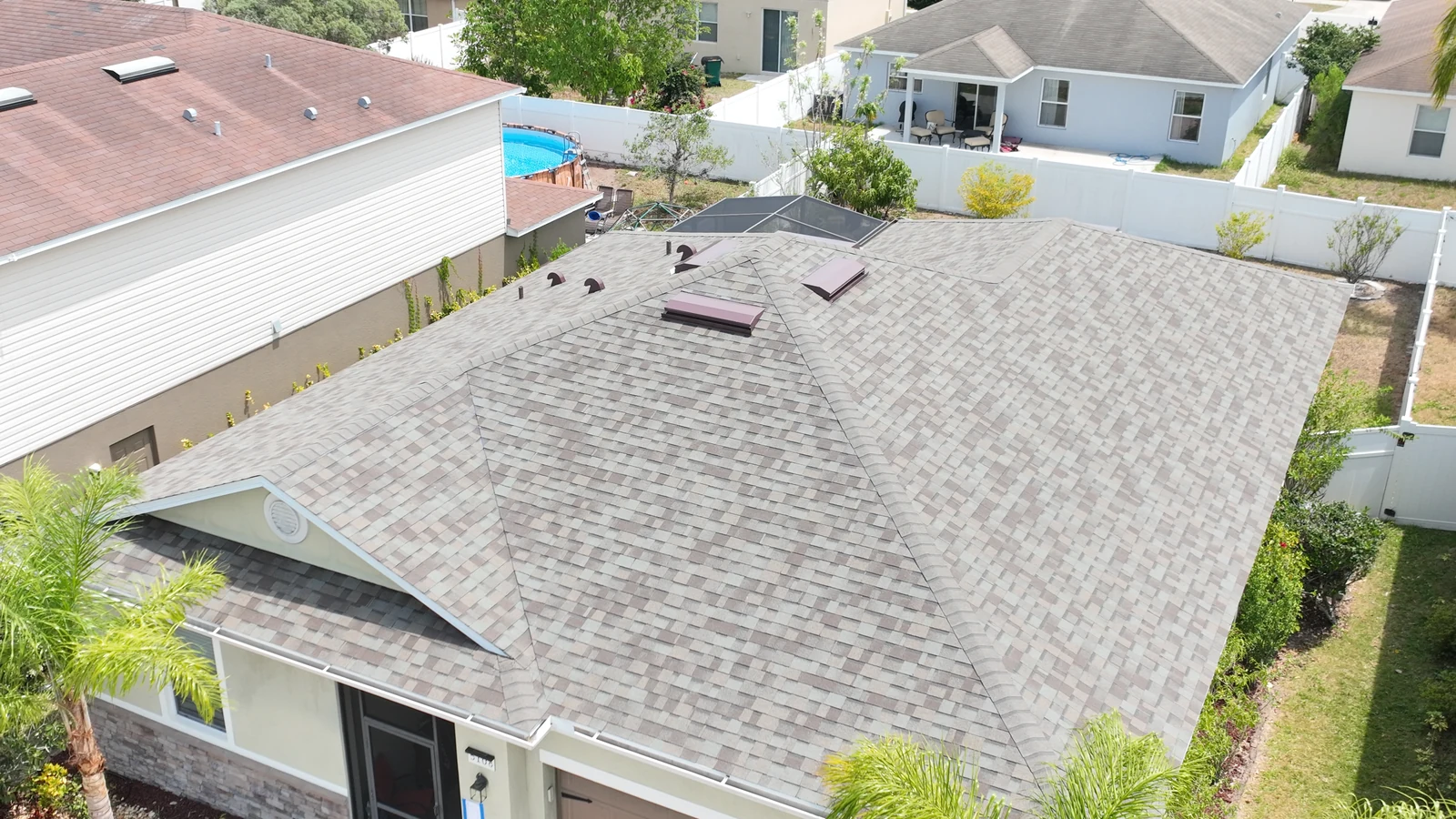 Roof-focused aerial view of the completed Owens Corning Duration roof in Mount Dora