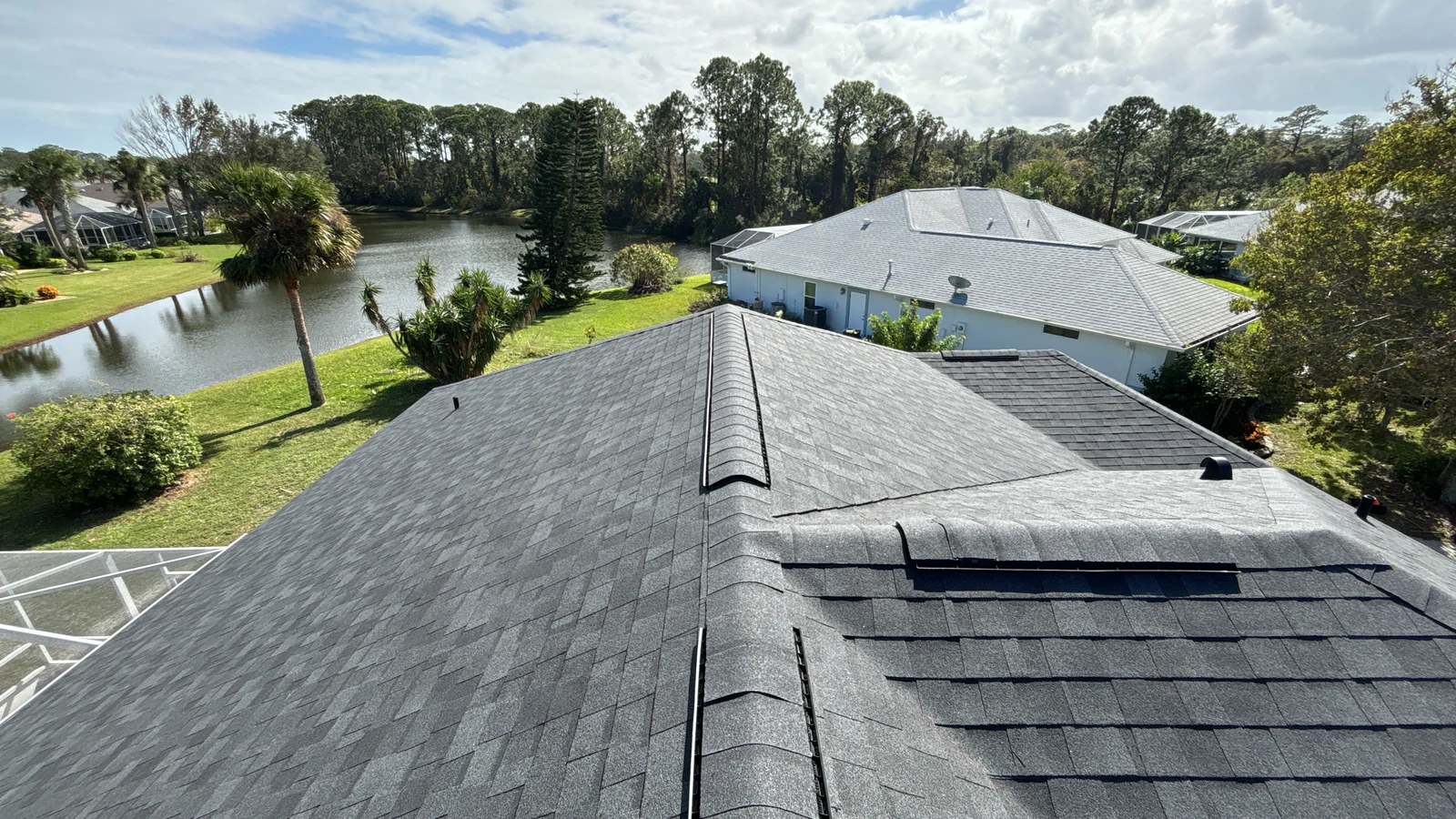 Roof-level view of the completed shingles on the New Smyrna home