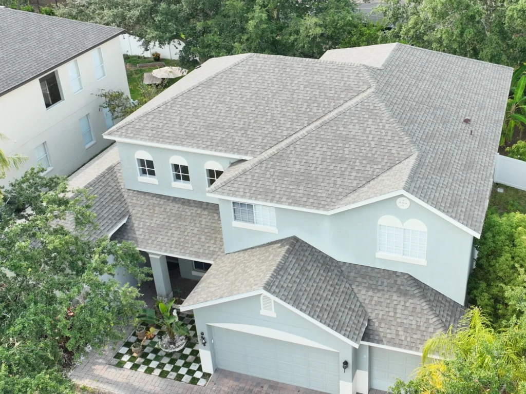 Roof-focused front aerial view of the completed Ocoee roof