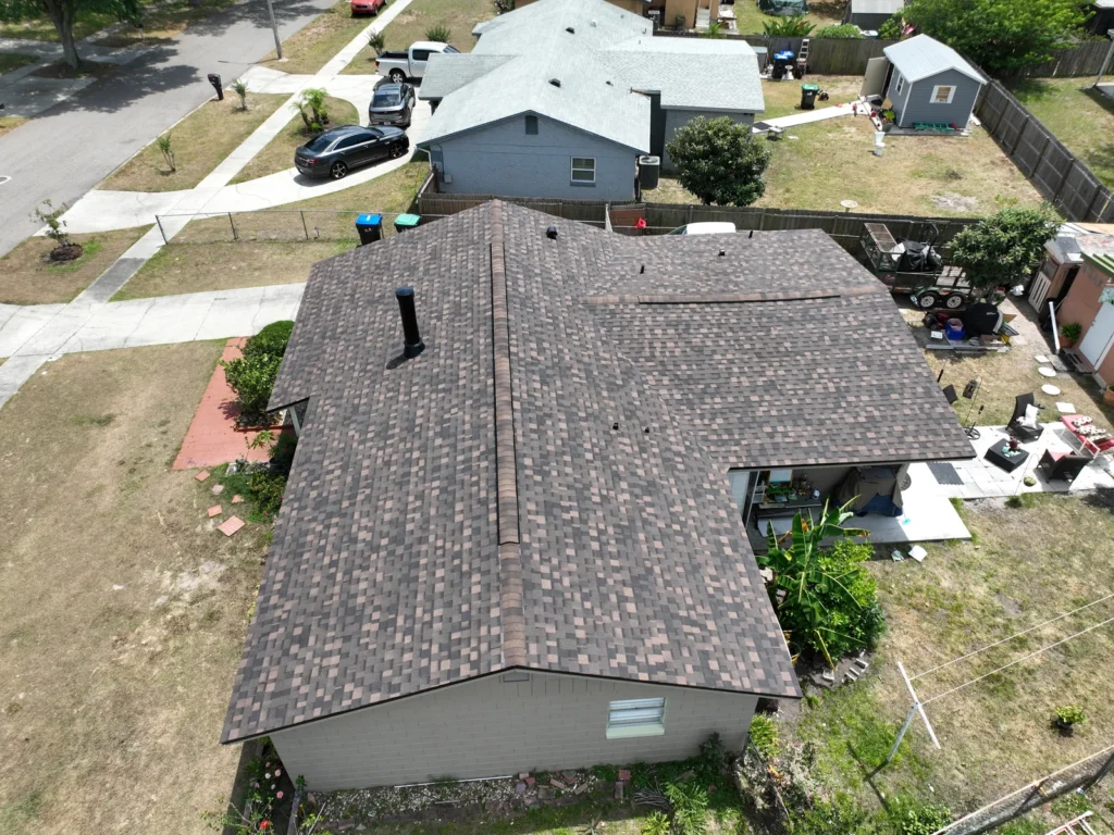 Rear aerial view of the completed Pine Hills roof and gutters