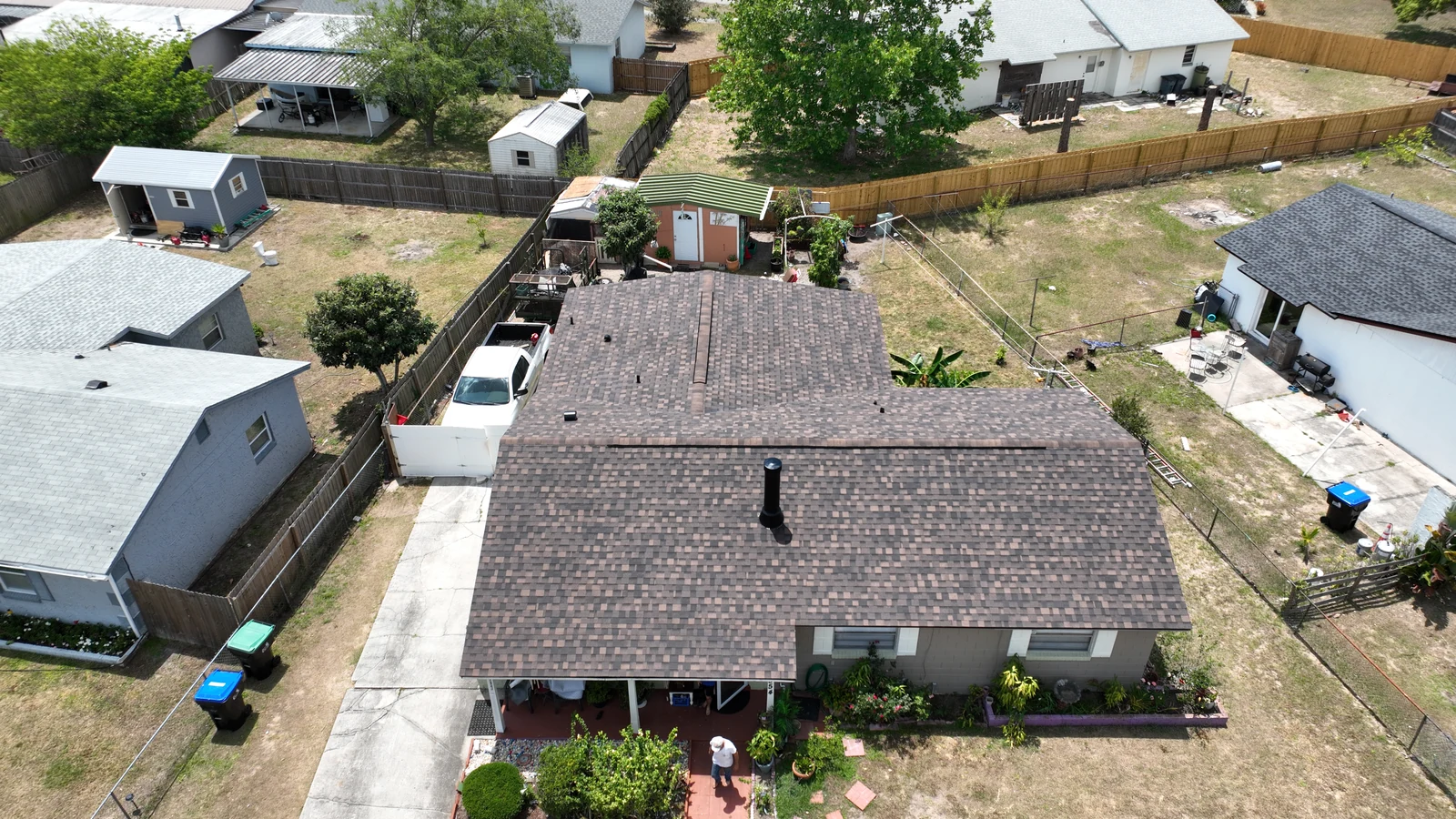Front aerial view of the completed Pine Hills roof and gutters