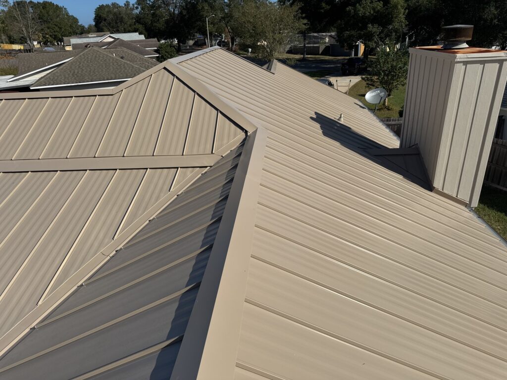 Close view of standing-seam metal roof valleys and panels