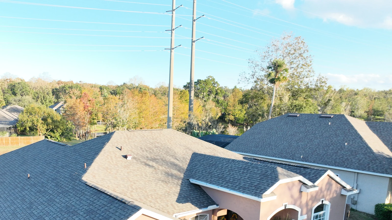 Roof-focused aerial view of the completed CertainTeed Landmark roof in Tuskawilla
