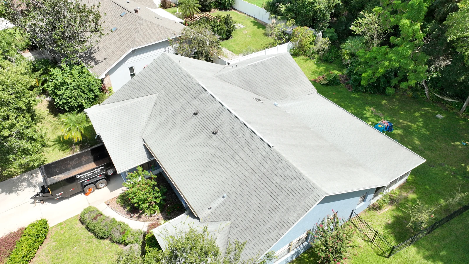 Oblique aerial view of the completed Tuskawilla shingle and flat roof sections